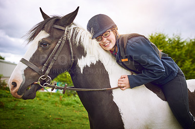 Buy stock photo Shot of a teenage girl going horseback riding on a ranch