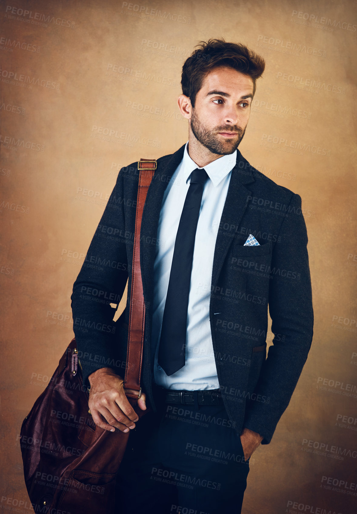 Buy stock photo Bag, vision and confident man with clothes for fashion, style and formal wear isolated on brown background. Male person, gentleman and businessman in trendy outfit, class or suit in studio backdrop