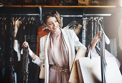 Buy stock photo Stylist, rich or happy woman shopping in boutique store looking at clothes or choosing her favorite style. Choice, decision or female designer with trendy apparel picking an outfit or classy fashion