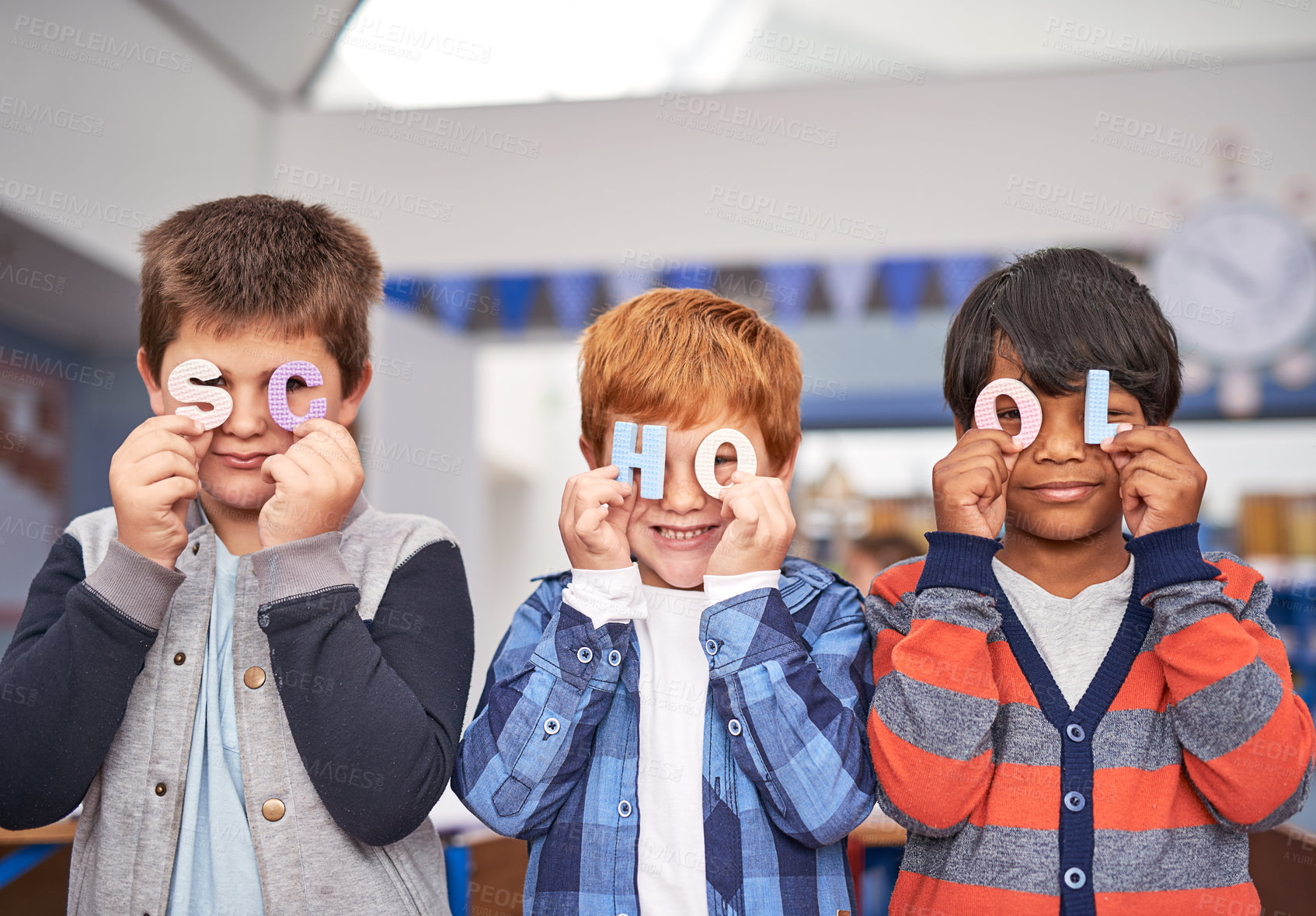 Buy stock photo Group, portrait or happy kids in classroom for letters, toys or alphabet for playing with friends or students. Boys, primary school and face of playful children for words, development or education  