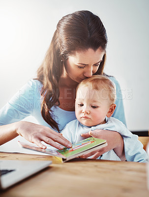 Buy stock photo Shot of a mother and her baby boy at home 