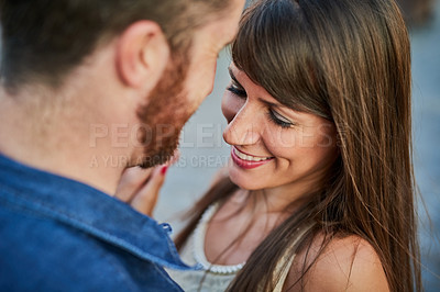 Buy stock photo Happy, couple and smile with love in city for romantic date, weekend and outdoor vacation together. Man, woman and care in romance with embrace in connection for honeymoon, adventure and marriage