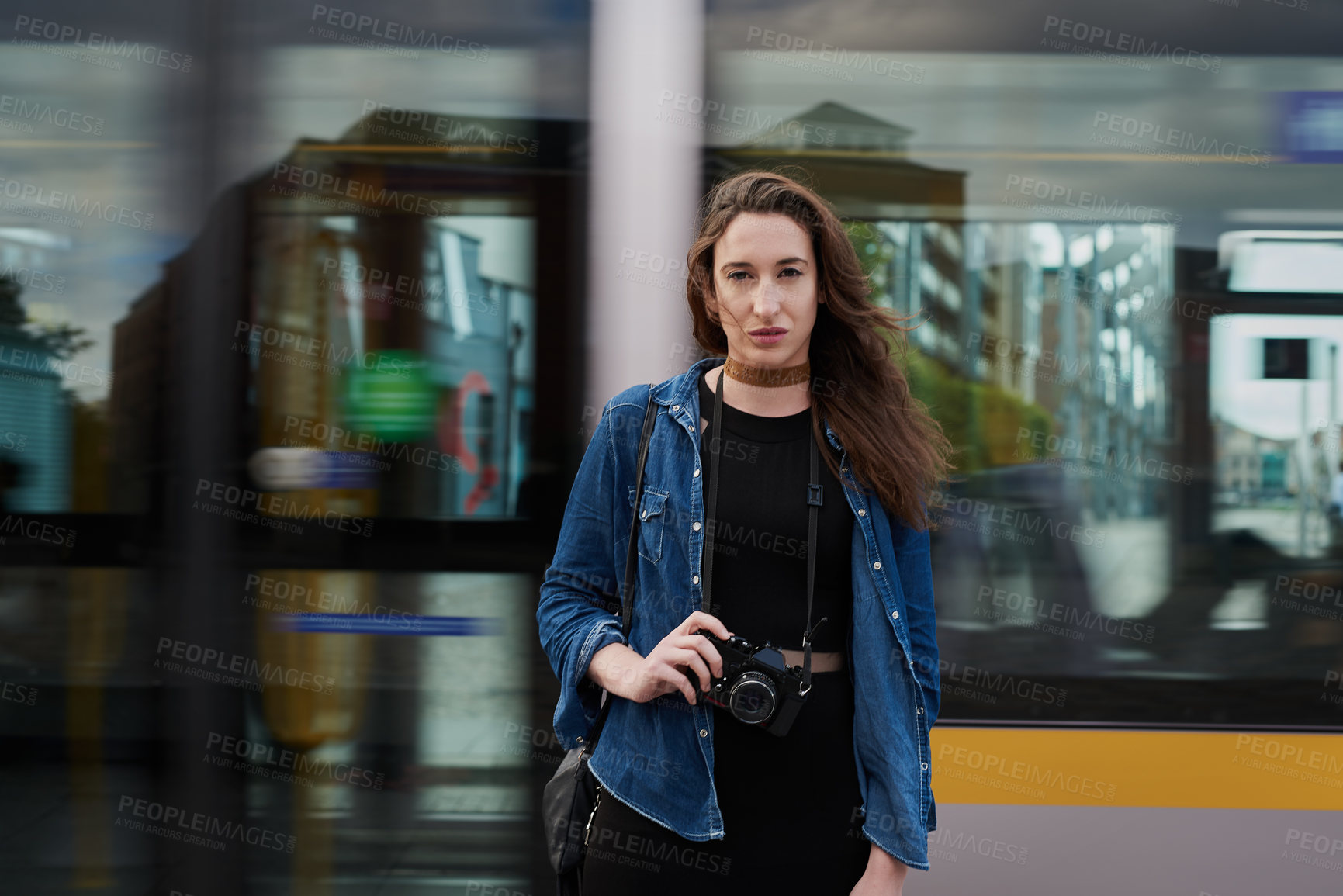 Buy stock photo Photographer, portrait and woman travel by train with camera in city for memory, vacation or tourism. Photography, subway or girl in urban street for public transportation with journalist in New York