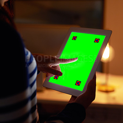 Buy stock photo Closeup shot of an unidentifiable businesswoman working late on a digital tablet with a chroma key screen in an office