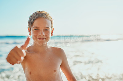 Buy stock photo Portrait, happy kid and thumbs up at beach for vacation, holiday review or summer trip to Greece. Face, child or like gesture at sea outdoor for travel, adventure or boy swimming in water with mockup