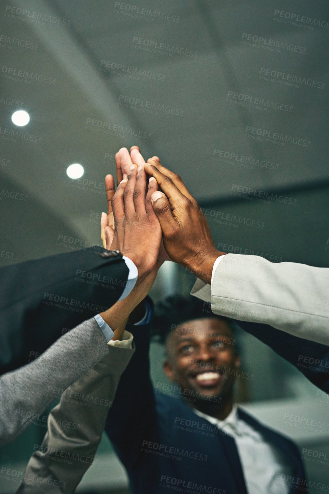 Buy stock photo Business people, high five and hands together for teamwork, low angle and collaboration success in office. Group, employee and workers with diversity, motivation or meeting for support or achievement