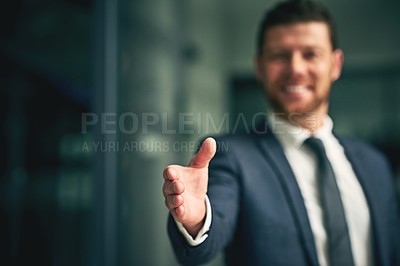 Buy stock photo Professional corporate businessman about to give a handshake as a greeting or agreement after negotiations on a deal, partnership or merger. Executive male offering formal gesture at business meeting