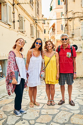 Buy stock photo City, portrait and smile of family outdoor together at foreign location for adventure or sightseeing. Holiday, travel or vacation with mother, father and sibling girls at old destination for trip