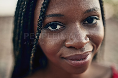 Buy stock photo Cropped shot of a beautiful young woman outside