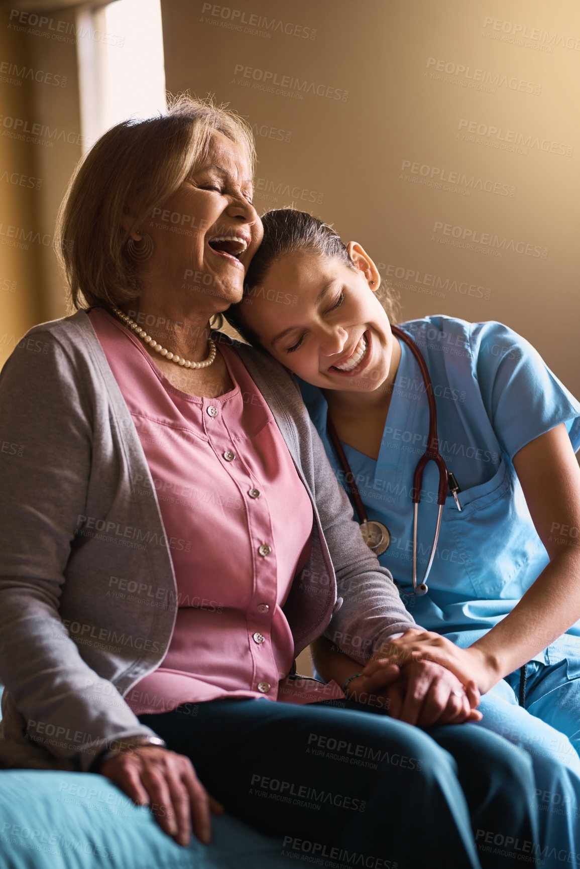 Buy stock photo Nurse, old woman and holding hands for support, funny and compassion with humor, wellness and joy. Caregiver, pensioner and patient with consultation, home or laugh with joke and healthcare advice