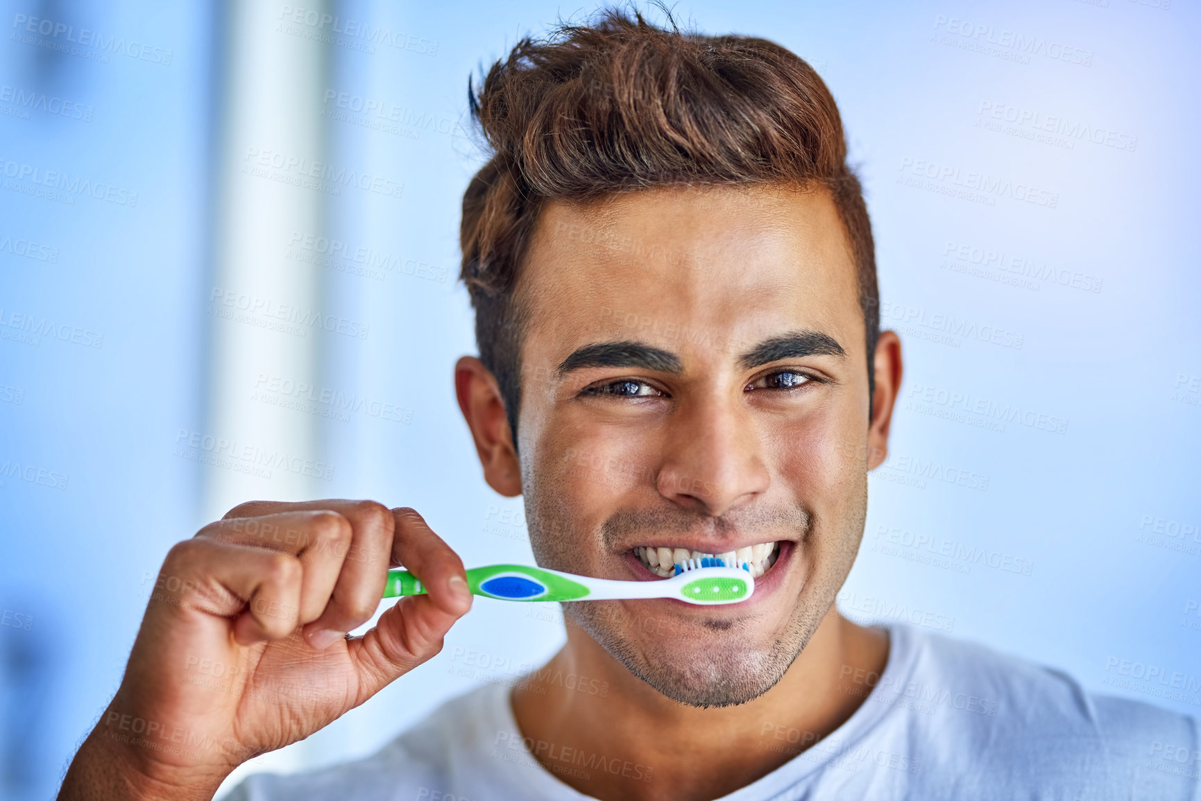 Buy stock photo Man, portrait and brushing teeth in bathroom for dental wellness, cleaning and care in home. Toothbrush, smile and morning routine with healthcare and oral hygiene with grooming for fresh breath