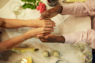 Buy stock photo Cropped shot of a man holding his girlfriend's hands