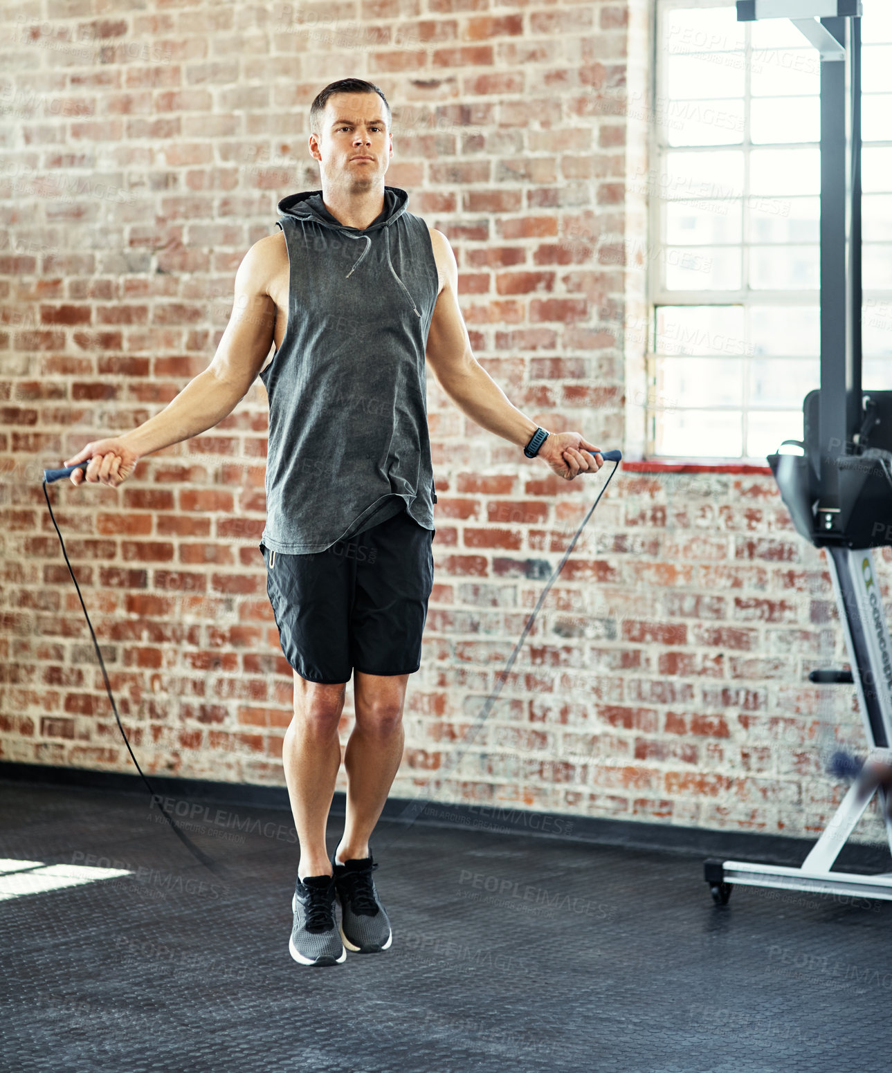 Buy stock photo Shot of a man working out in a gym