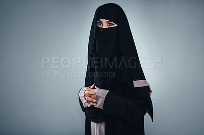 Buy stock photo Studio portrait of a young muslim businesswoman against a grey background