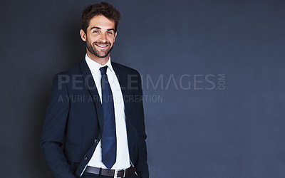 Buy stock photo Portrait, mockup and smile with a formal businessman in studio on a blue background for about us corporate style. Success, fashion and a confident male employee in a suit for professional power