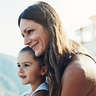 Buy stock photo Happy, hug and mother with child for bonding, connection and family time together outdoor. Smile, relax and mom holding and embracing boy kid with care, love and sweet moment in backyard of home.