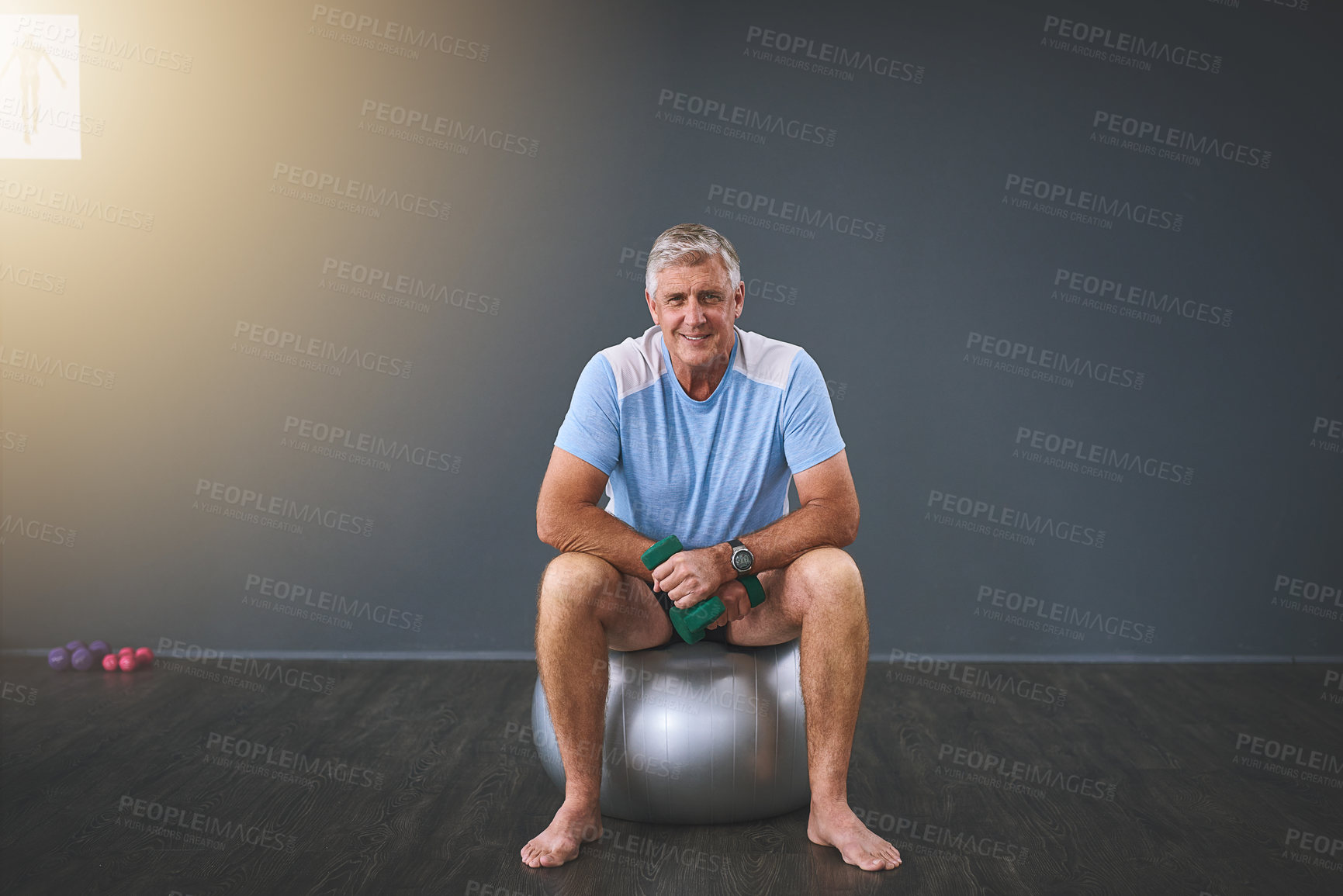 Buy stock photo Full length portrait of a handsome senior man doing rehabilitative exercises