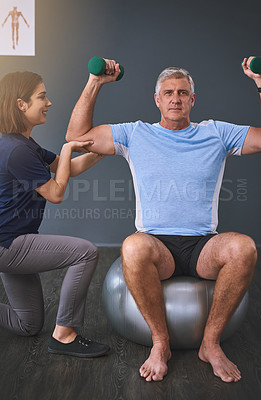 Buy stock photo Cropped shot of a female physician working with a senior male patient