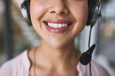 Buy stock photo Cropped shot of a cheerful unrecognizable businesswoman talking to customer using a headset