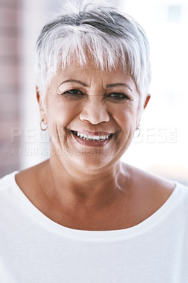 Buy stock photo Portrait of a cheerful mature woman with a bright smile looking at the camera