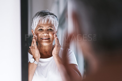 Buy stock photo Beauty, cream and senior woman in bathroom for anti aging, collagen and wrinkles treatment. Skincare, cosmetics and lotion with mature person in mirror at home for glow, dermatology and sunscreen