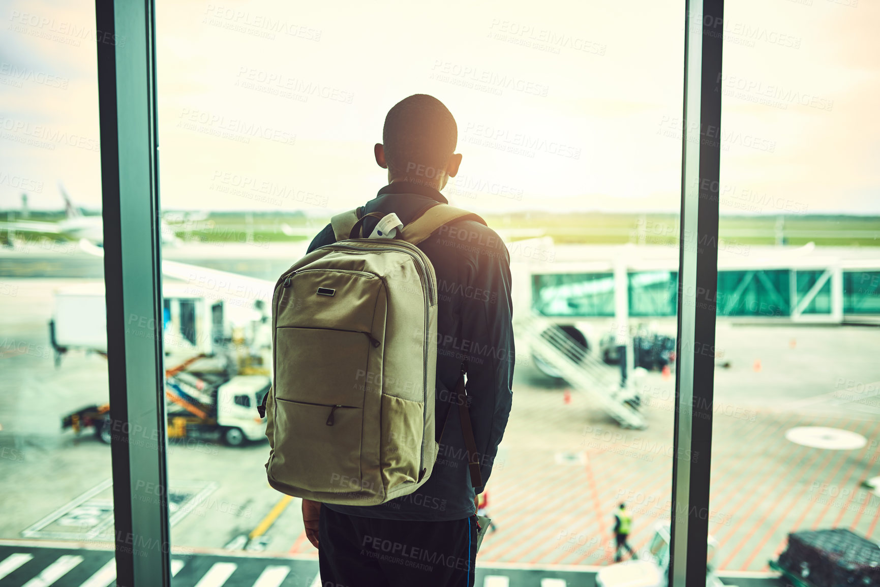 Buy stock photo Window, back and man with backpack, plane and glass for view of outdoor, travel and journey. Sightseeing, aircraft and person with luggage for trip, international and waiting room for flight