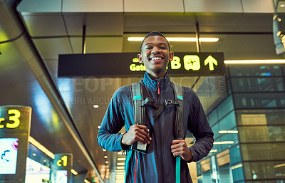 Buy stock photo Shot of a young man in an airport