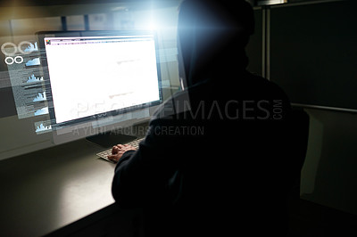 Buy stock photo Rearview shot of an unrecognizable male computer programmer working on new code