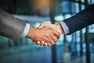 Buy stock photo A handshake showing teamwork, collaboration and togetherness by business colleagues after a meeting in the office. A successful agreement has been reached by male coworkers in a business deal