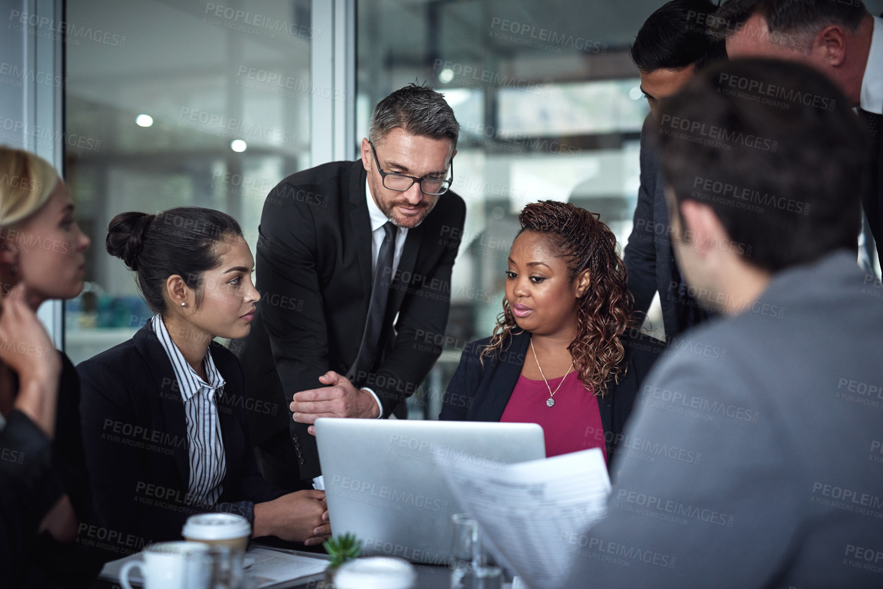 Buy stock photo Business people, director and laptop in meeting for leadership, solution and collaboration in office. Talking, teamwork or executive in group discussion for feedback, planning or project in corporate