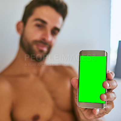 Buy stock photo Hand, man and phone with green screen in home for contact, online dating or ads on app. Closeup, chroma key or mobile display for social media, mockup space or shirtless person show info presentation