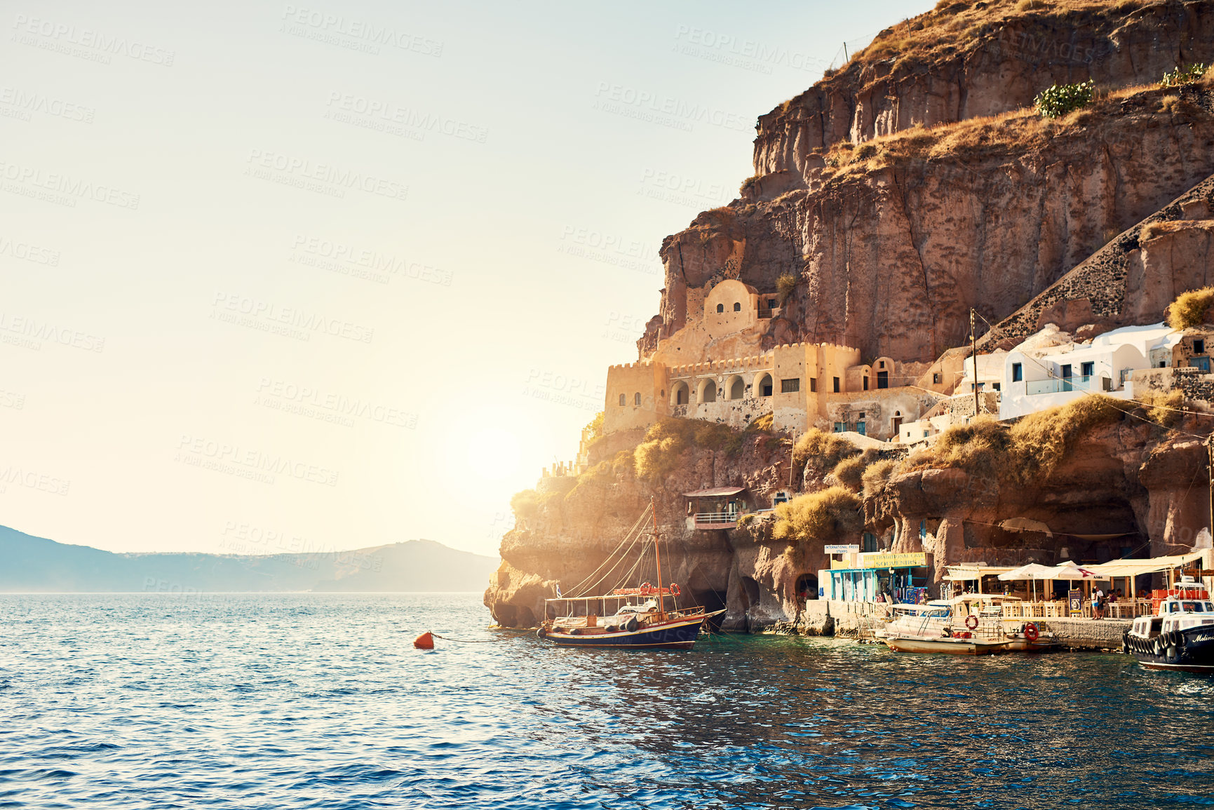 Buy stock photo Background shot of a beautiful shoreline landscape in the mediterranean during the day