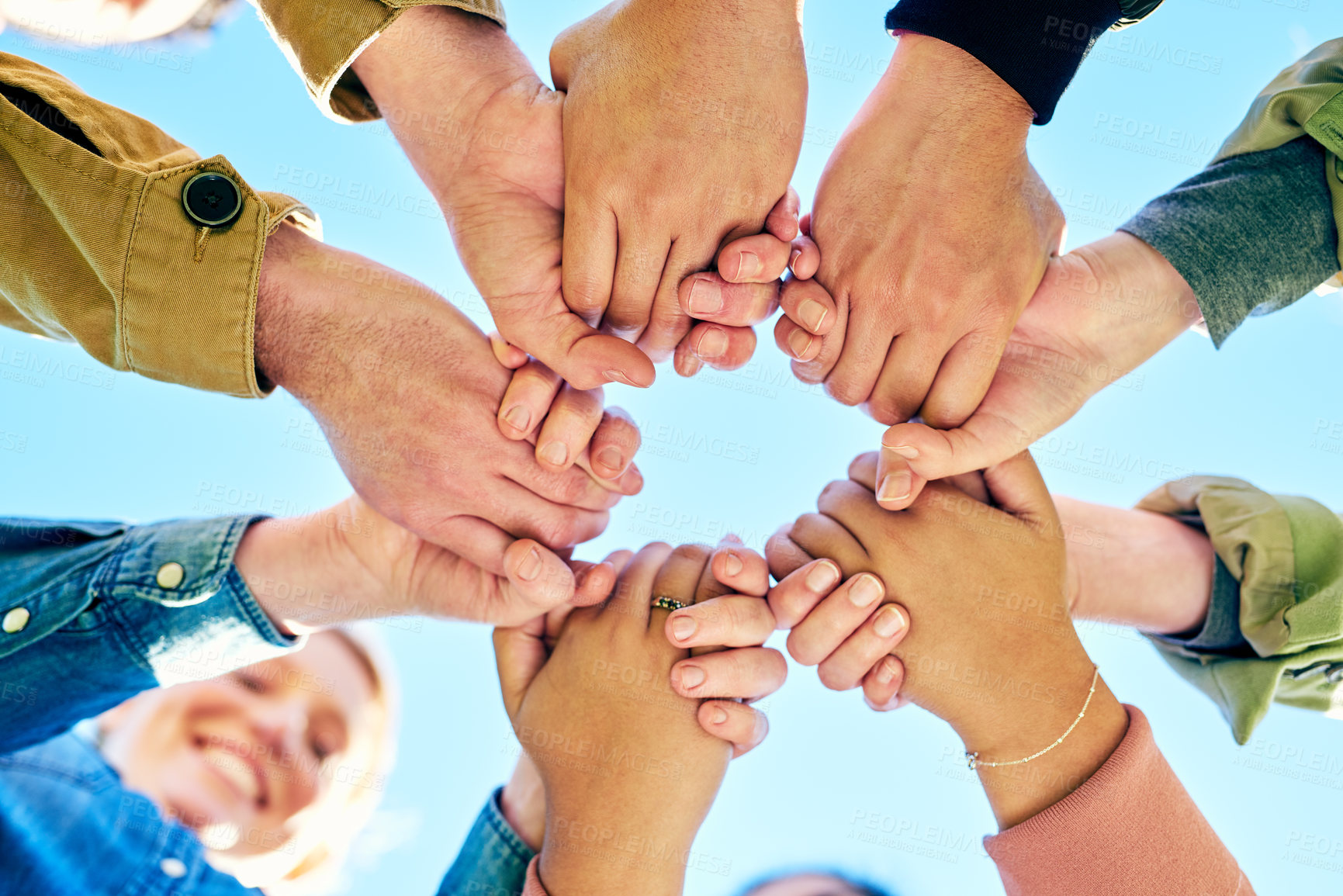Buy stock photo Shot of a  group of young students enjoying the day outside together
