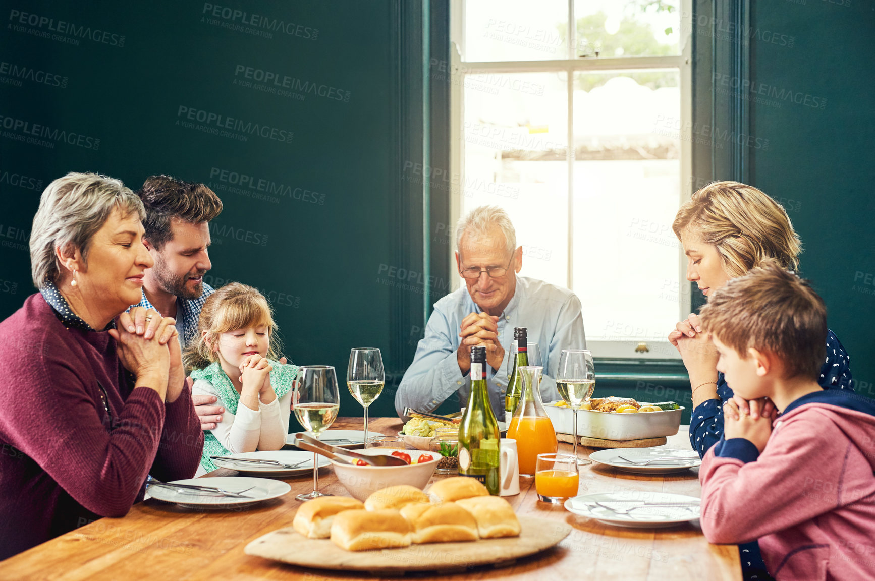 Buy stock photo Family, hands and prayer with wine, feast and gathering with thanksgiving celebration. People, dinner and praise with religion, lunch and bonding with retirement and holiday or vacation reunion
