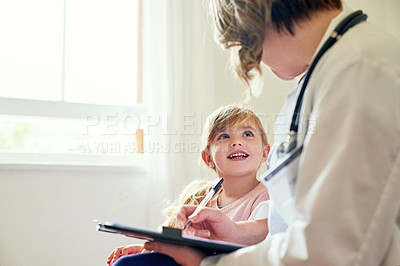 Buy stock photo Young girl, doctor and consultation with medical checklist with a smile in a hospital for wellness. Happiness, clinic consultant and pediatrician with healthcare and kids appointment with child form