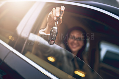 Buy stock photo Portrait of a businesswoman holding the keys to her new car