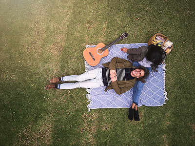 High angle shot of a young couple having a romantic date in the park