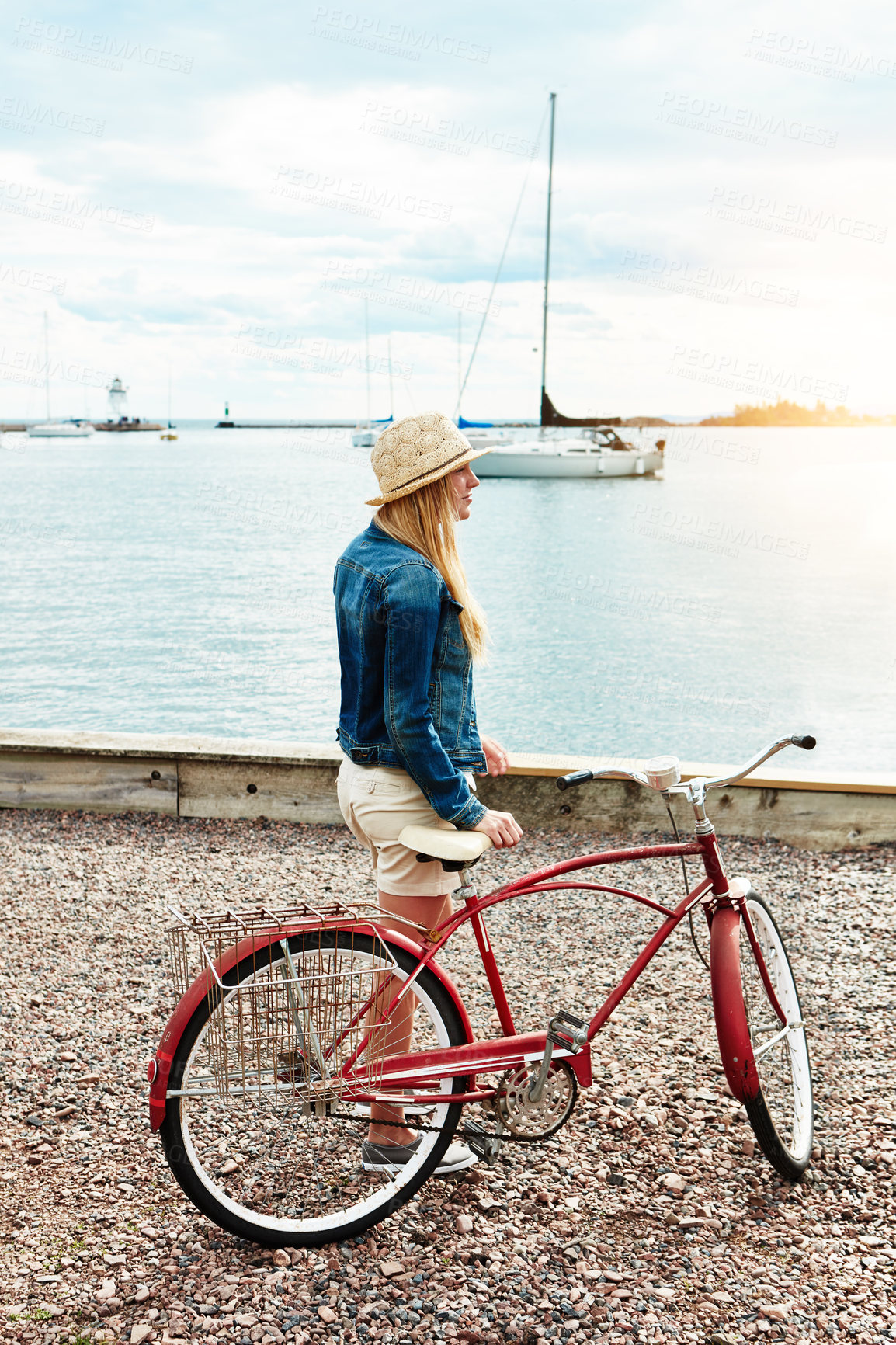 Buy stock photo Thinking, travel and woman with bicycle by ocean for view, sightseeing and mindset on vacation. Bike, break and reflection of girl by sea outdoor on trip with transport on holiday by harbor
