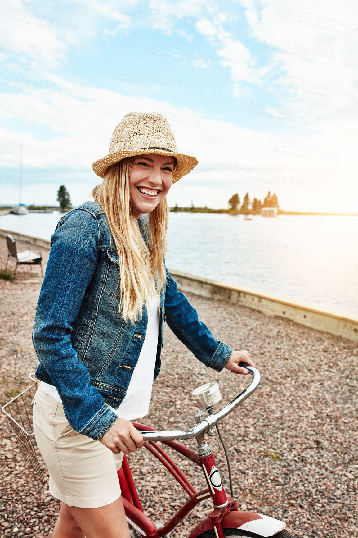 Buy stock photo Outdoor, adventure and woman with bicycle, portrait and travel on summer holiday, happy and journey. Traveler, smile and person with eco friendly transport for trip in nature, fresh air and commuting
