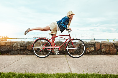 Buy stock photo Woman, bicycle and playful with travel outdoor for holiday, transport and weekend health. Happy, female person and tourists with cycling, vacation or activity on bike for wellness, adventure or break