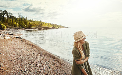 Buy stock photo Laughing, woman and break at beach, travel and happy on adventure, tourism and fresh air on holiday. Outdoor, traveler and person with smile in nature, thinking and relax on vacation, sea or space