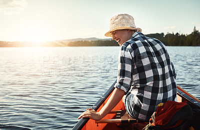 Buy stock photo Woman, kayaking and laughing on lake in nature, relax and water travel or hobby in boat on holiday weekend with paddle. Adventure, river and rowing or tourist activity, calm and outdoor for fitness