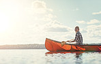 Taking her canoe out onto calm waters