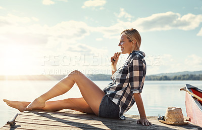 Buy stock photo Woman, relax and sunset view by lake for peace, holiday and travel by water with happy or cam. Female tourist, smile and sun in nature for vacation, summer and wellness by pond with thinking