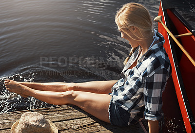 Buy stock photo Female person, nature or travel with feet in water, relax on vacation with freedom by lake for wellness. Woman, sustainable holiday or foot splash in river with, kayak for adventure tourism in Canada