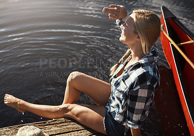 Buy stock photo Woman, river and vacation with feet in water, relax or travel with freedom in nature for wellness. Female person, happiness and holiday by lake with foot splash, kayak for adventure tourism in Canada