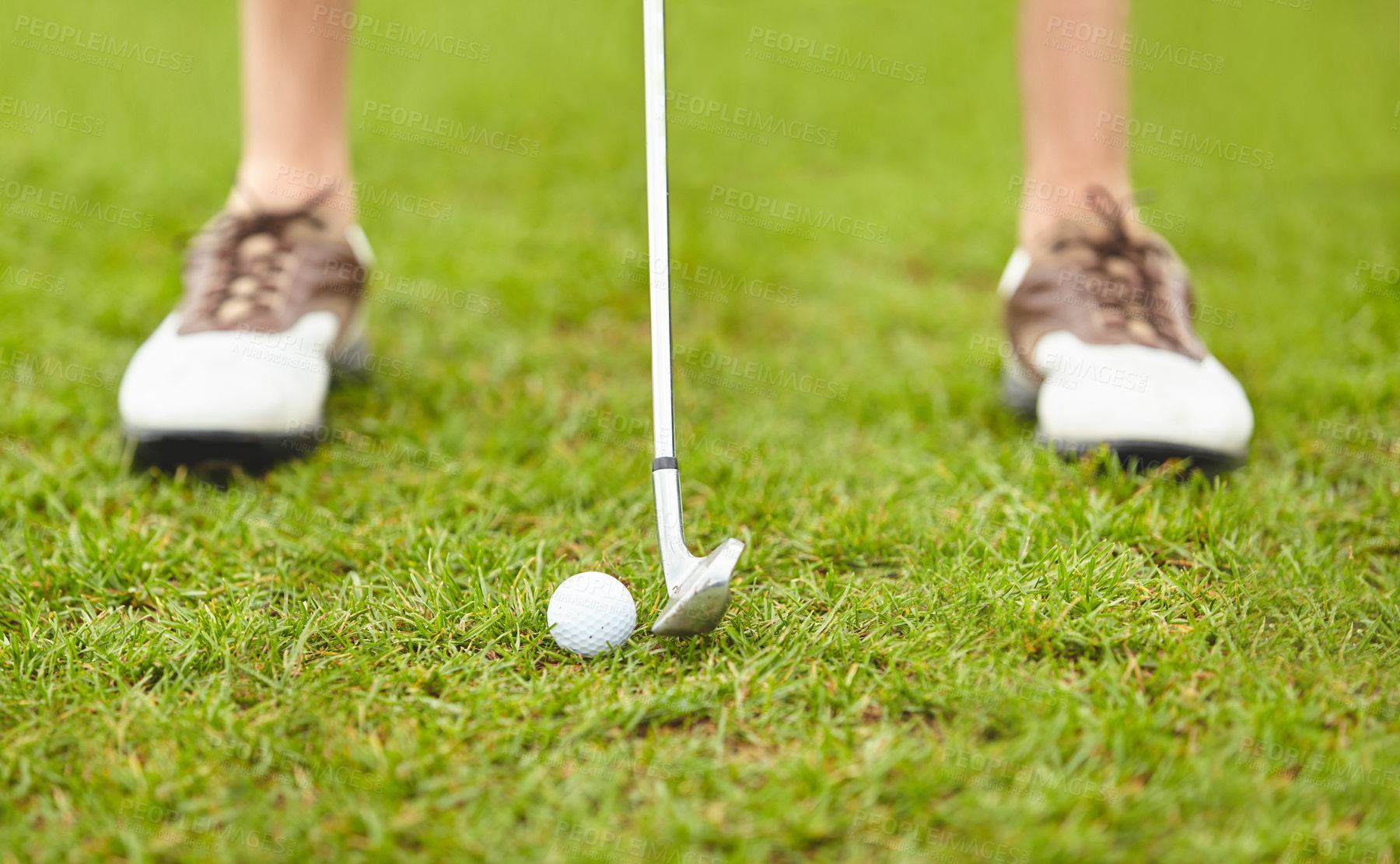 Buy stock photo Cropped shot of an unrecognizable woman out playing golf on a golf course