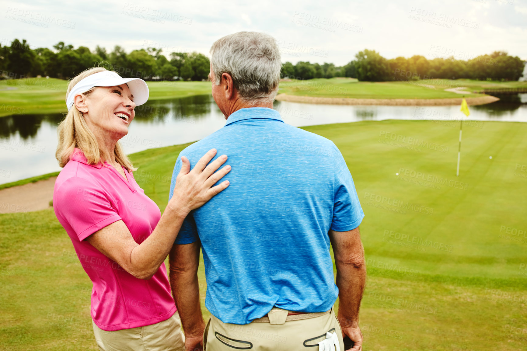 Buy stock photo Active, mature couple and golf outdoor with sports support, bonding and recreation practice for fitness. Smile, woman and man on field with love, care and relax for retirement activity on holiday