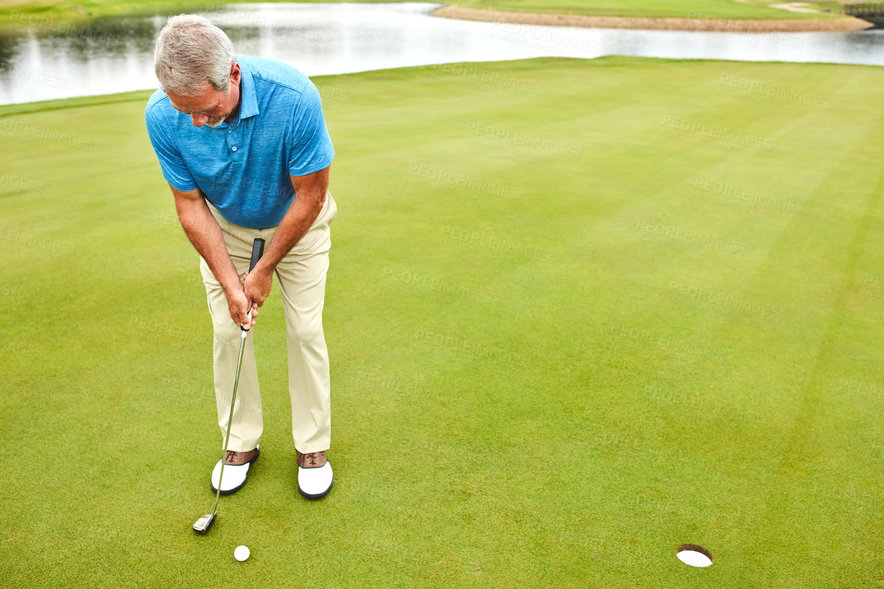 Buy stock photo Mature, man and stroke on golf course or nature for recreation sport, practice and training for tournament match. Male golfer, country club and playing by lake for skill or coordination and exercise.