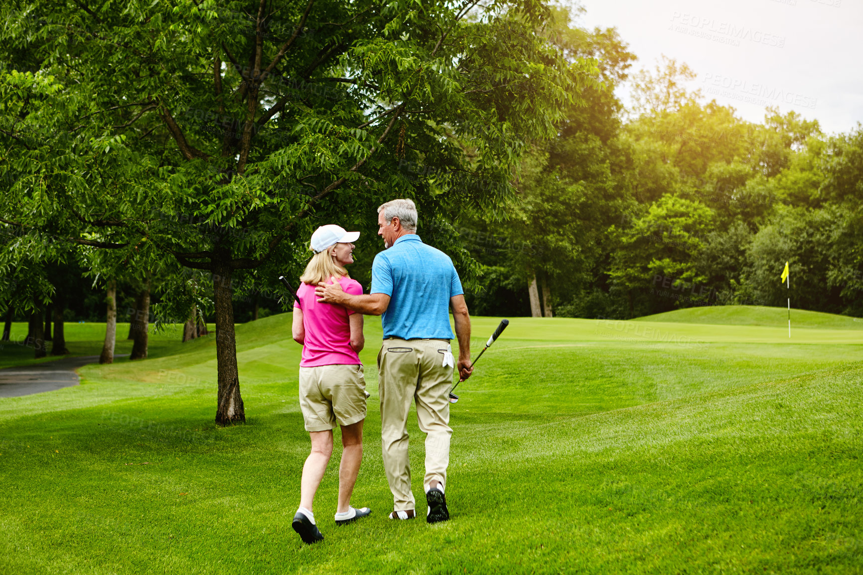 Buy stock photo Back, mature couple and happy at golf course with sports,  hobby and activity for retirement. People, break and bonding at field for fitness, training and exercise for health or mindfulness with fun